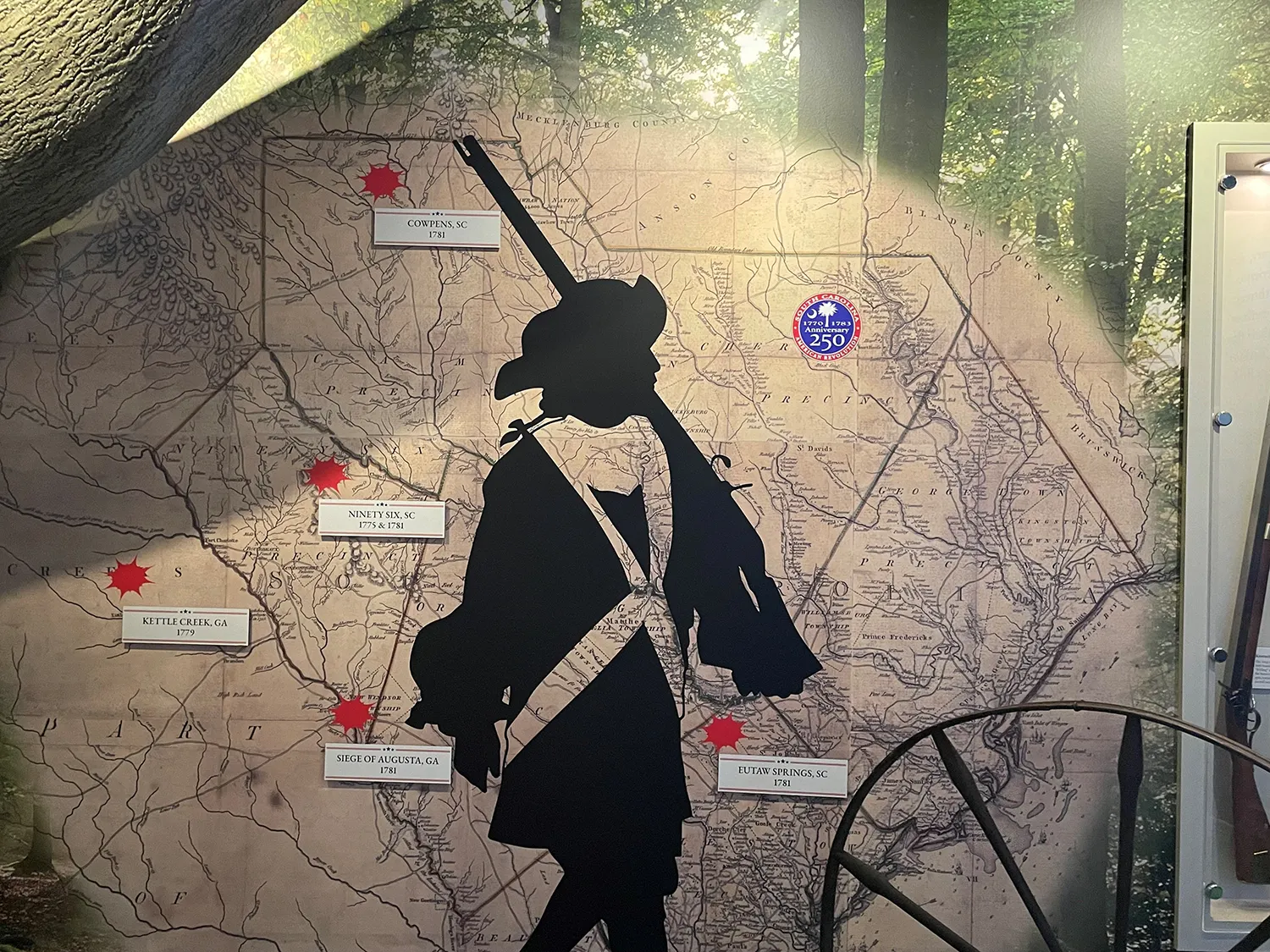 Soldier in front of a map of South Carolina.