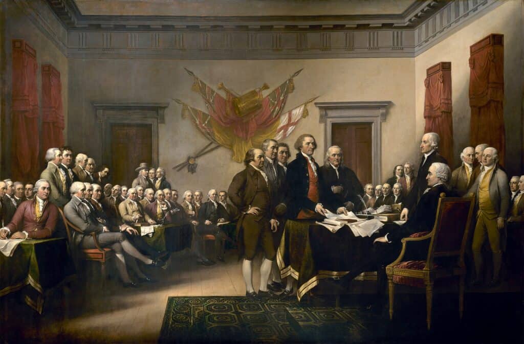 Signing of the Declaration of Independence in a historic room.